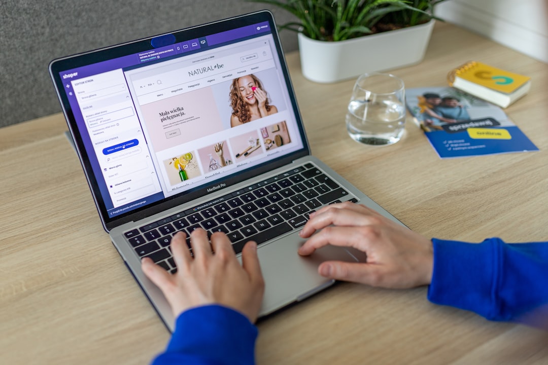 contact-img Hands typing on keyboard, changing online store design